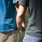 Gay couple hold hands
