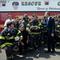 US President Barack Obama greets firefighters with the New York Fire Department at the Wall Street Heliport prior to boarding Marine One in New York, April 22, 2010. Obama traveled to speak about refo