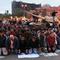 praying in front of a tank in protest in Egypt