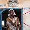 A woman smiles as she leaves a polling station in Juba on January 12, 2011 in South Sudan