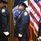 NYPD officers wait in line during a ceremony at One Police Plaza.