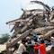 Bangladeshi volunteers and rescue workers are pictured at the scene after an eight-storey building collapsed in Savar, on the outskirts of Dhaka, on April 25, 2013.