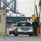 Customs Border Protection officers check vehicles entering the United States from Canada at the Ambassador Bridge in Detroit, Tuesday, April 21, 2009. 