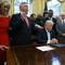 In this Sept. 1, 2017 file photo, religious leaders pray with President Donald Trump after he signed a proclamation for a national day of prayer to occur.