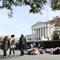 People wait in line outside the Supreme Court in Washington, Monday, Nov. 11, 2019, to be able to attend oral arguments in the case of President Trump's decision to end the Obama-era DACA program.