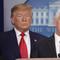 President Donald Trump, left, listens to Vice President Mike Pence, right, as he pauses while speaking to members of the media to address the nation about the coronavirus threat in the Press room.