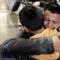 David Xol-Cholom, of Guatemala hugs his son Byron at Los Angeles International Airport as they reunite after being separated about one and half years ago during the Trump administration.