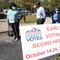 People wait to vote outside the Bordeaux Library on the first day of Tennessee's early voting Wednesday, Oct. 14, 2020, in Nashville, Tenn. The early, in-person voting period runs Monday through Satur