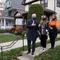 Democratic presidential candidate former Vice President Joe Biden speaks to reporters after he visited his childhood home in Scranton, Pa., Tuesday, Nov. 3, 2020, as granddaughters Natalie, center, an