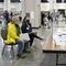 Election workers, right, verify ballots as recount observers, left, watch during a Milwaukee hand recount of presidential votes at the Wisconsin Center, Friday, Nov. 20, 2020, in Milwaukee.