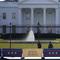A security team patrols in front of the White House as preparations continue ahead of President-elect Joe Biden's inauguration ceremony, Tuesday, Jan. 19, 2021, in Washington.