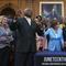 House Majority Whip James Clyburn, D-S.C., left, celebrates with Speaker of the House Nancy Pelosi and members of the Congressional Black Caucus after passage of the Juneteenth National Independence 