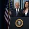 President Joe Biden listens as Vice President Kamala Harris speaks during an event to mark the start of monthly Child Tax Credit relief payments, in the South Court Auditorium on the White House compl