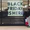 A 'Black Friday' sign is posted at a retail location in Philadelphia, Monday, Nov. 21, 2022. Bargain hunting is back with full force heading into the holidays.