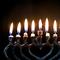Menorah candles burning