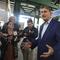 West Virginia Democratic Sen. Joe Manchin speaks with reporters outside the newly renovated Amtrak train station in Charleston, W.Va. on Thursday, Oct. 12, 2023