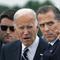 President Joe Biden talks with his son Hunter Biden as he arrives Delaware Air National Guard Base in New Castle, Del., Tuesday, June 11, 2024.