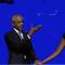 Former President Barack Obama hugs former first lady Michelle Obama as he is introduced during the Democratic National Convention Tuesday, Aug. 20, 2024, in Chicago.
