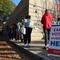 People wait in line for early voting for the midterm elections at Ponce De Leon Library on November 04, 2022 in Atlanta, Georgia.