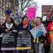 Protestors march as part of the Women's March which nationwide campaigned for legislation and policies regarding human rights, women's rights, immigration reform, healthcare reform, the natural enviro