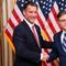 U.S. House Speaker Mike Johnson (R-LA) poses for a photo with Rep. Tom Suozzi (D-NY) during a ceremonial swearing-in at the U.S. Capitol on February 28, 2024 in Washington, DC. 