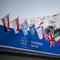 A sign of the World Economic Forum (WEF) is seen on the top of the Congress Centre that hosts the WEF annual meeting in the Alpine resort of Davos on its opening day in Davos on January 19, 2026. 