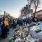  People pay their respects at a memorial site for Alex Pretti on January 25, 2026 in Minneapolis, Minnesota.
