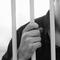 Man behind bars