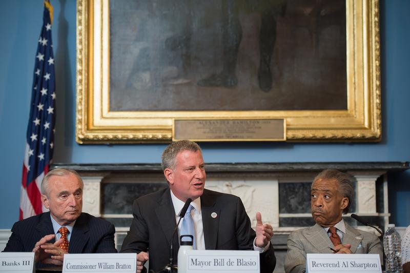 Mayor Bill de Blasio hosts a roundtable on police-community relations with Commissioner Bill Bratton, Reverend Al Sharpton, and others in City Hall's Blue Room, in C