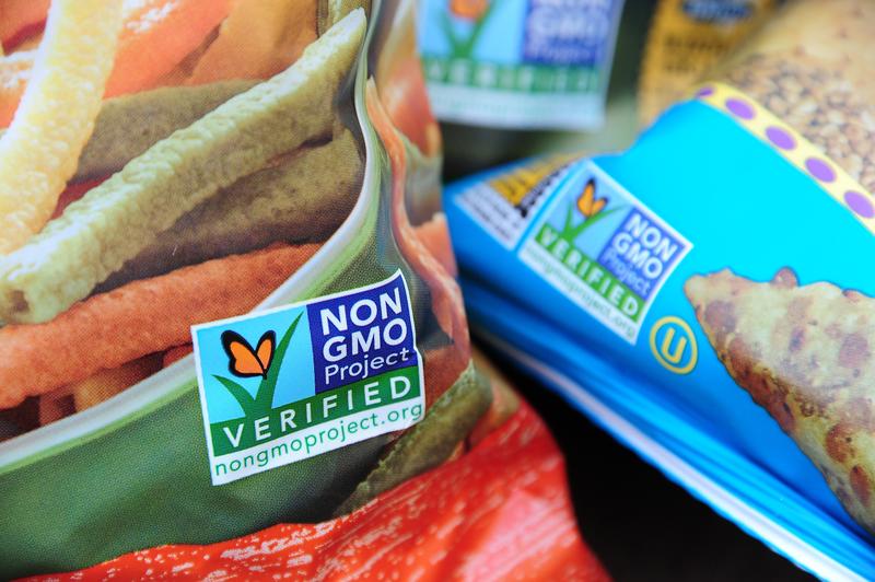 Labels on bags of snack foods indicate they are non-GMO food products, in Los Angeles, California, October 19, 2012. 