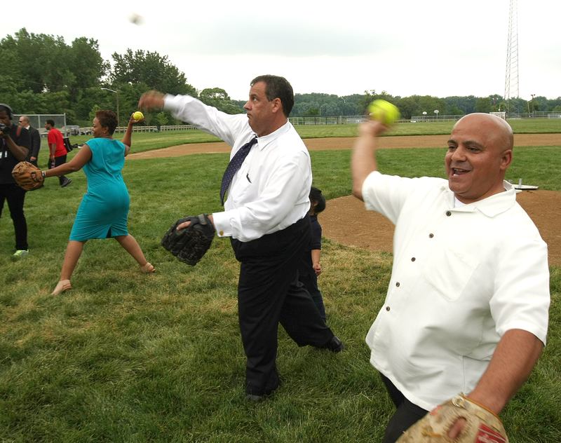 Gov. Christie plays catch with Camden kids alongside Camden Mayor Dana Redd and Council President Frank Moran, both Democrats.