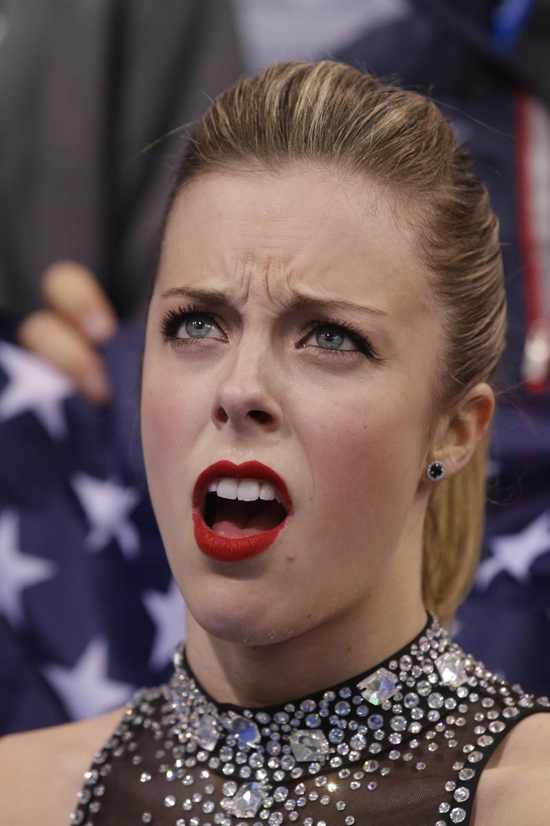 U.S. figure skater Ashley Wagner begs to differ with the scores from the team short program at the Sochi Olympics.