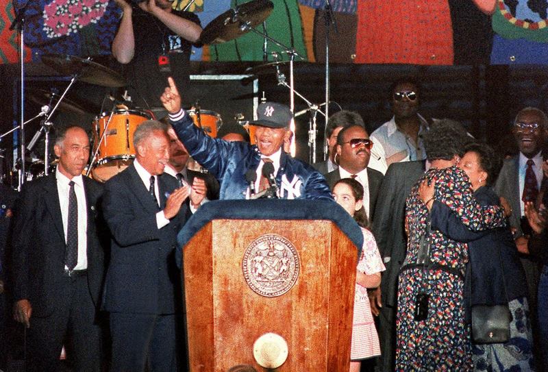 Nelson Mandela, on stage with Mayor David Dinkins, on his 1990 visit to NYC