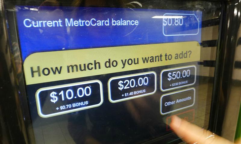 A vending machine with the (old) options to fill a MetroCard.