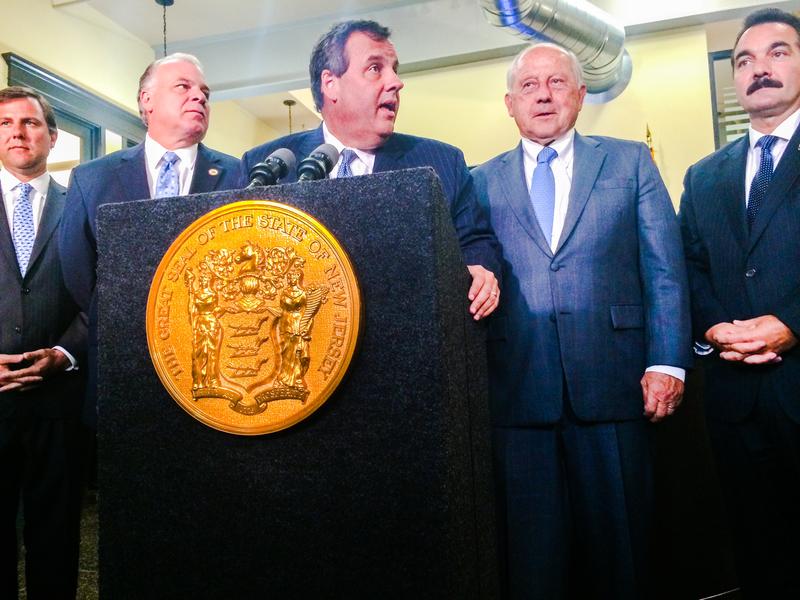 Gov. Chris Christie is flanked by, from left to right, Senate Minority Leader Tom Kean, Senate President Stephen Sweeney, gubernatorial gaming adviser Jon Hanson and Assembly Speaker Vincent Prieto. 