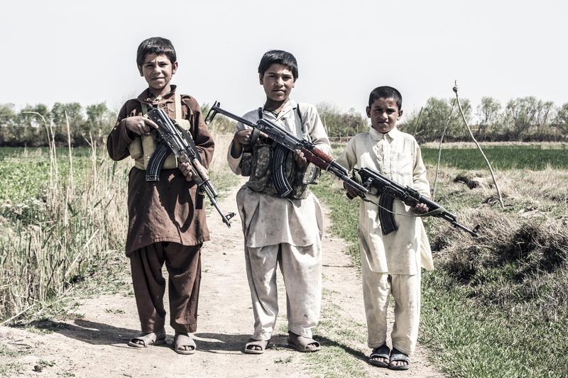 Boys aged 10, 12 and 14 help to fight and defend their village from the Taliban alongside the Afghan Local Police.