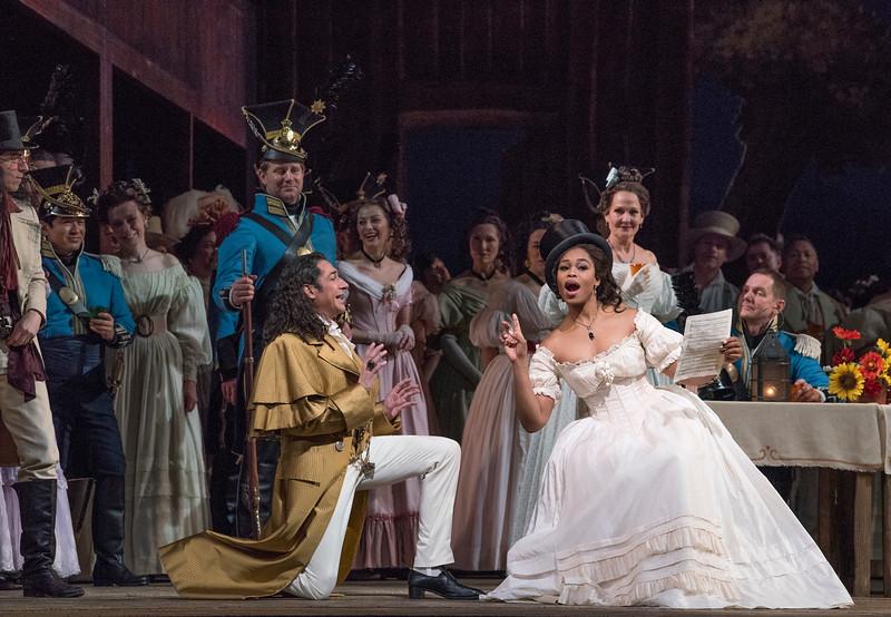 Ildebrando D'Arcangelo as Dulcamara and Pretty Yende as Adina in Donizetti’s “L’Elisir d’Amore.”