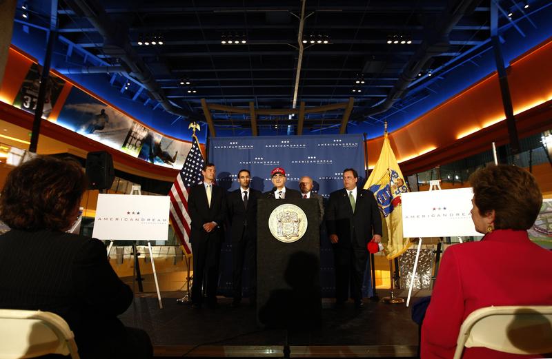 Nader Ghermezian, center, and Paul Ghermezian, center left, announce plans to operate the retail complex, American Dream, with Governor Chris Christie, far right, May 3, 2011, East Rutherford, NJ