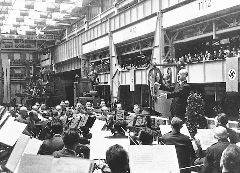 Wilhelm Furtwangler & the Vienna Philharmonic at an armaments factory in Berlin in May 1943