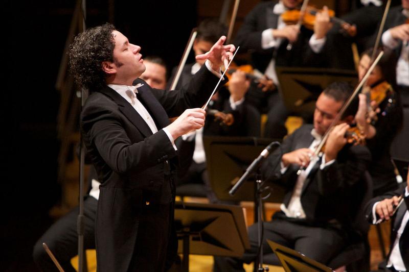 Gustavo Dudamel conducting an orchestra