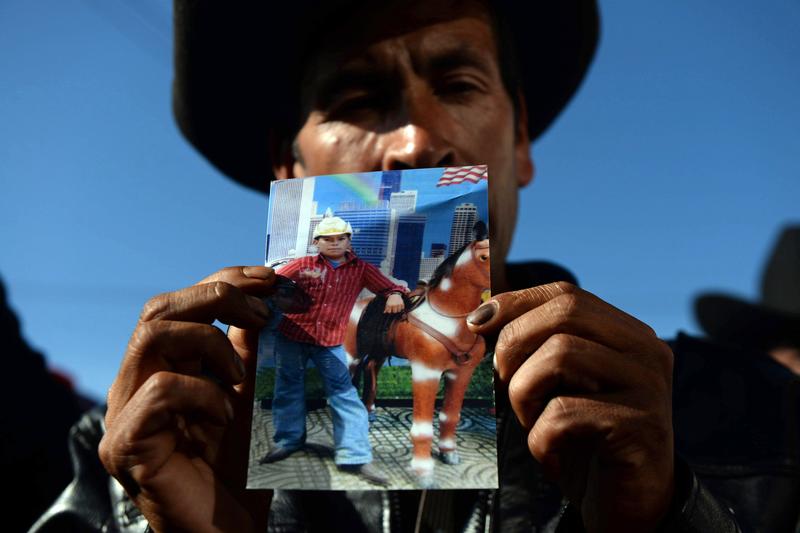 Guatemalan Francisco Ramos shows a picture of his son Gilberto Francisco Ramos, a 15-year-old boy who died in the Rio Grande Valley in Texas, while trying to reach the United States on his own.