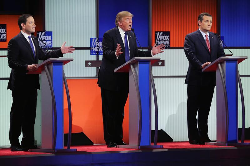 Republican presidential candidates (Lto R) Sen. Marco Rubio (R-FL), Donald Trump and Sen. Ted Cruz (R-TX) participate in a debate sponsored by Fox News at the Fox Theatre on March 3, 2016 in Detroit.