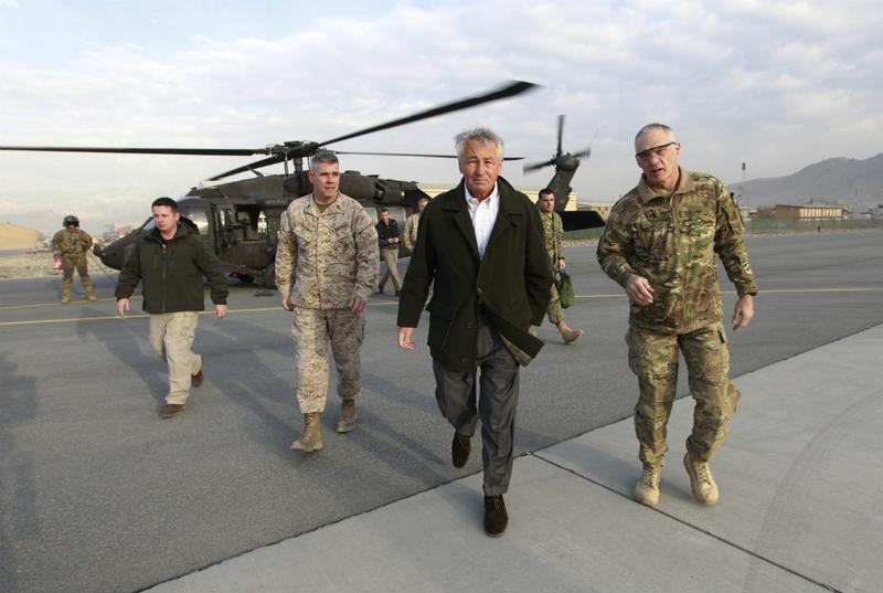 U.S. Secretary of Defense Chuck Hagel walks from a blackhawk helicopter as he ends his first trip to Afghanistan as Secretary of Defense.