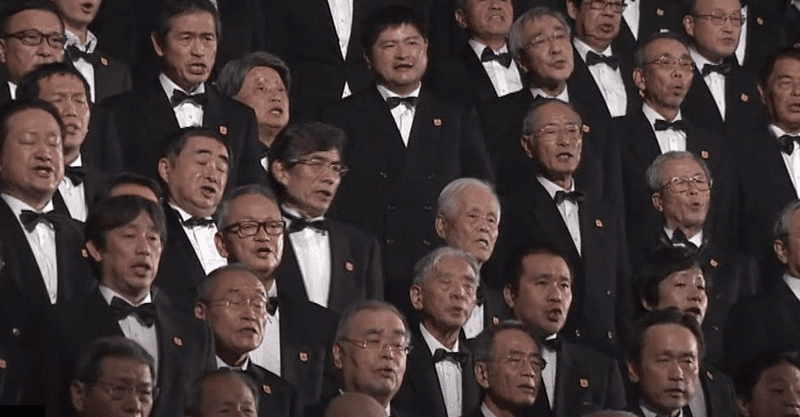 A choir sings "Ode to Joy"