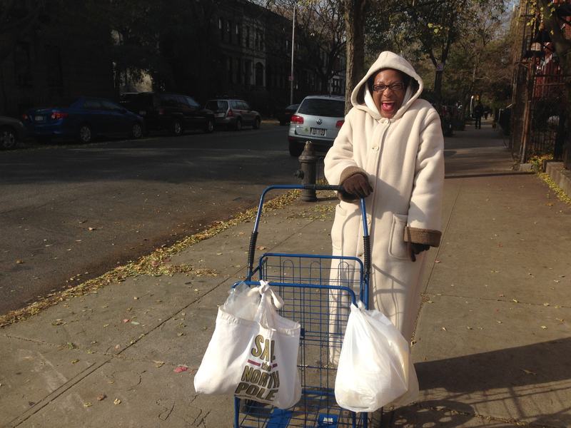 Gloria Miles, 58, a retired caregiver in Prospect Heights, walks her clothes to the laundromat in the winter.