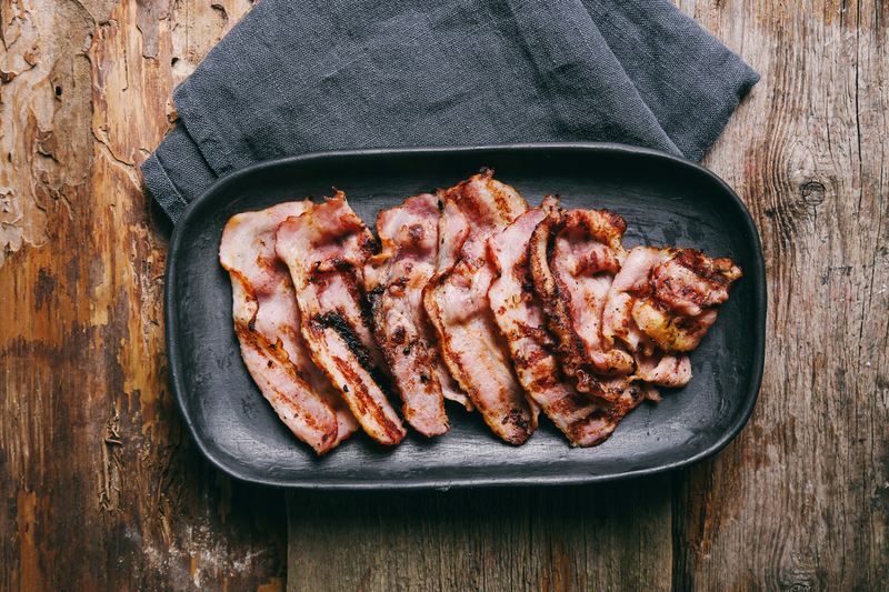 A new report from the World Health Organization finds that processed meats like bacon and hot dogs can cause cancer, and that red meat itself is a carcinogen. 