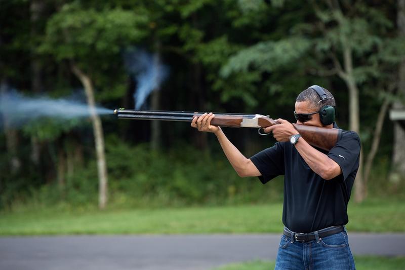 President Barack Obama shoots clay targets on the range at Camp David, Md., Saturday, Aug. 4, 2012. 