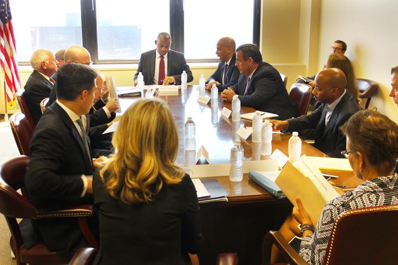U.S. Transportation Secretary Anthony Foxx, center, met with New Jersey Gov. Christie in August to pressure local officials to help pay for a new Hudson River train tunnel.
