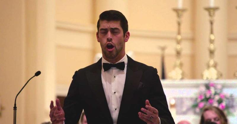 Baltimore Ravens kicker sings "Ave Maria" at a Christmastime benefit concert.