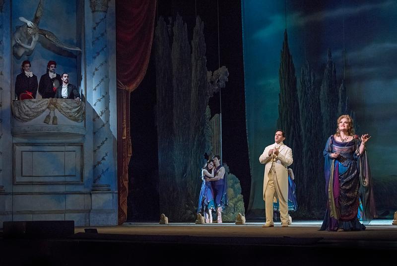 Christian Van Horn (left) as Mefistofele, Michael Fabiano as Faust, and Jennifer Check as Helen of Troy.